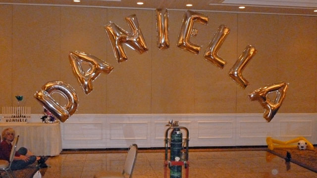 Letter Balloon Arch in Progress A close up without the tank